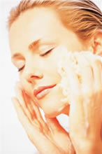 woman washing with non toxic skin care
